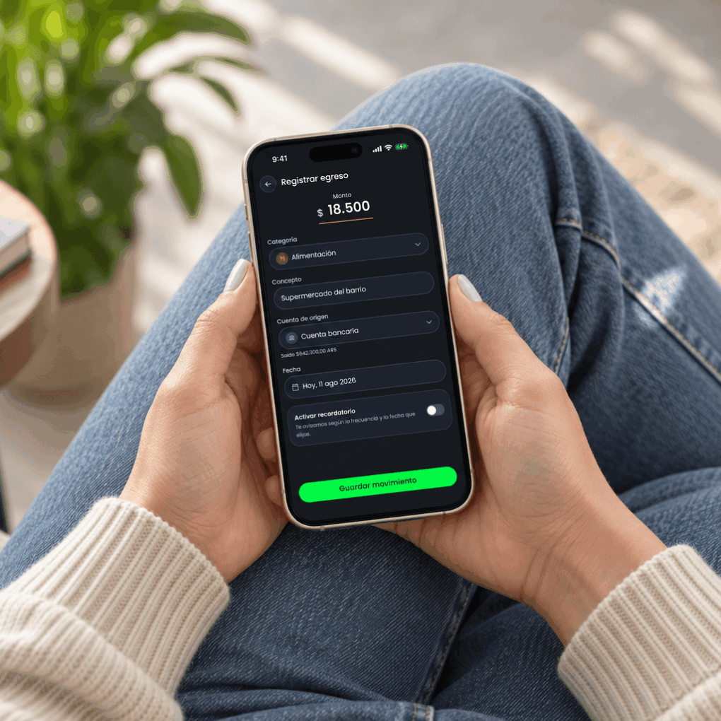 Finami – Expense Registration Person holding an iPhone displaying Finami’s expense form with amount, category, account, and date fields.